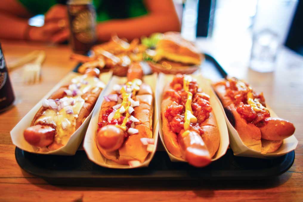 hot dogs on table